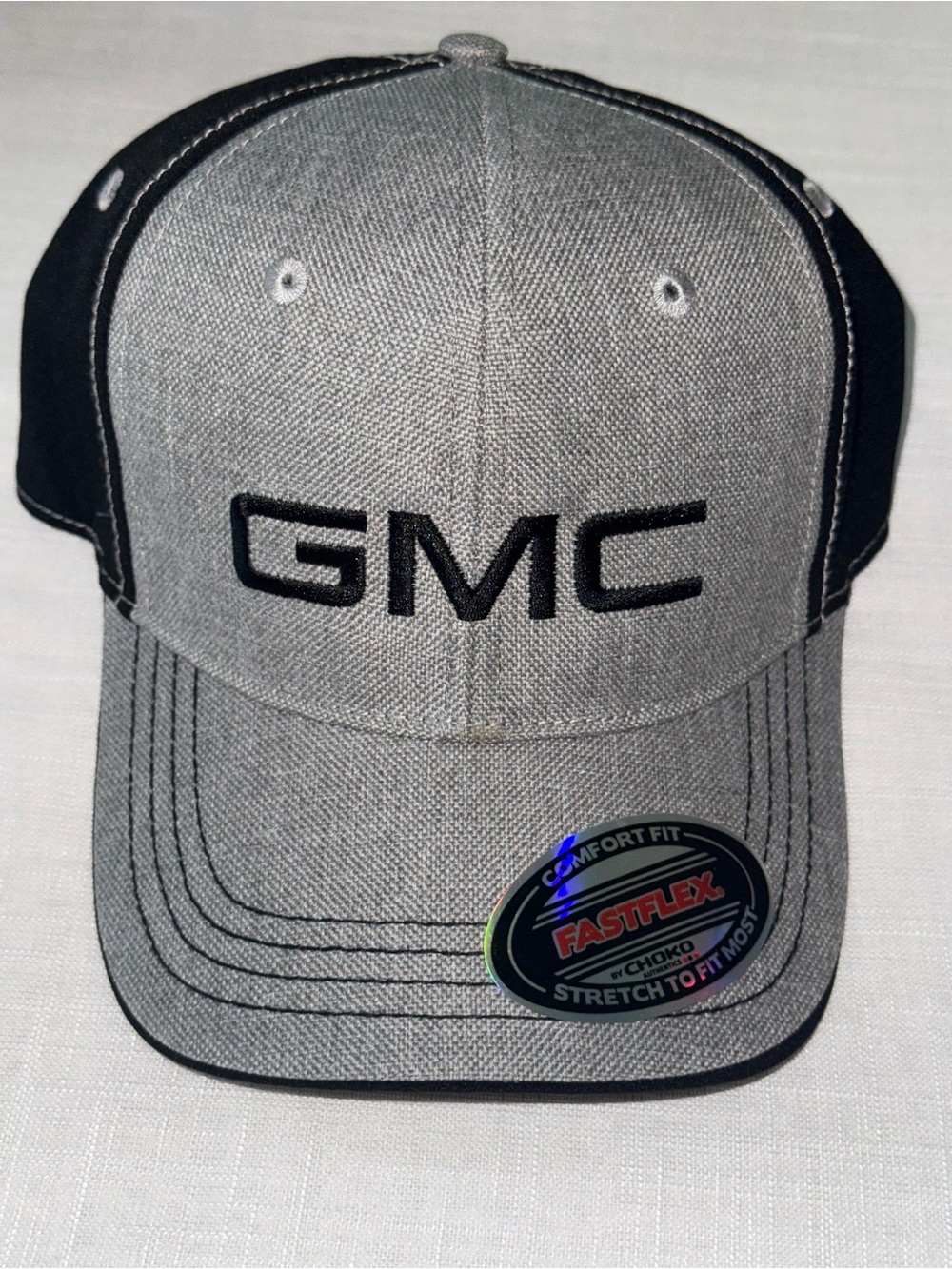 GMC Fastflex stretch-to-fit trucker hat, manufactured by Choko Authentics.